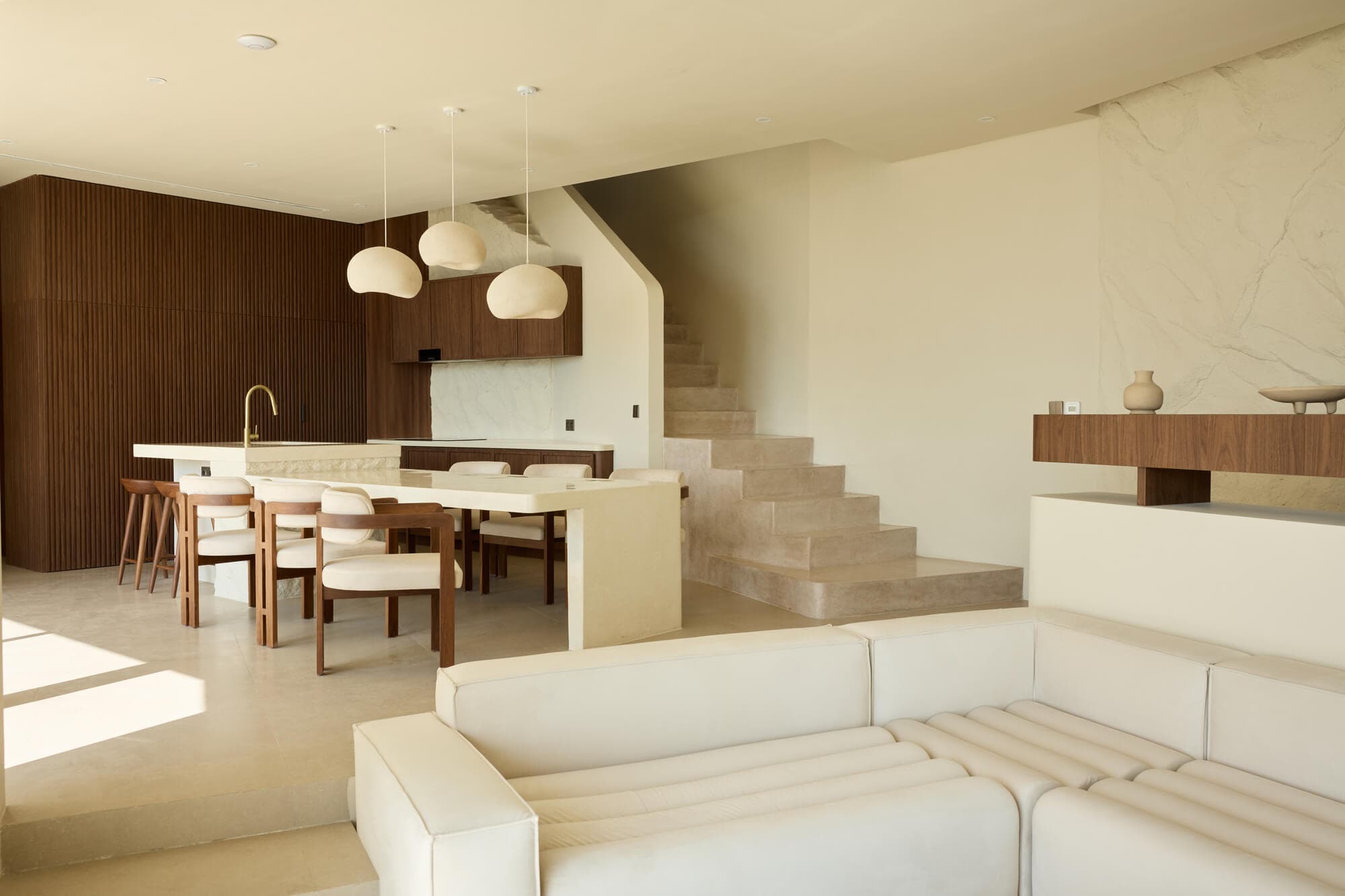 FIRA suite with warm timber interiors and ocean views